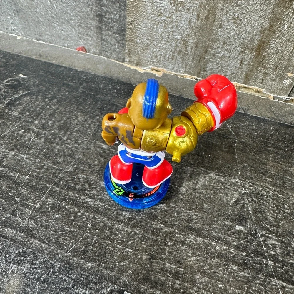 Akedo Ultimate Arcade Warriors Series 1 Buster Bling Action Figure